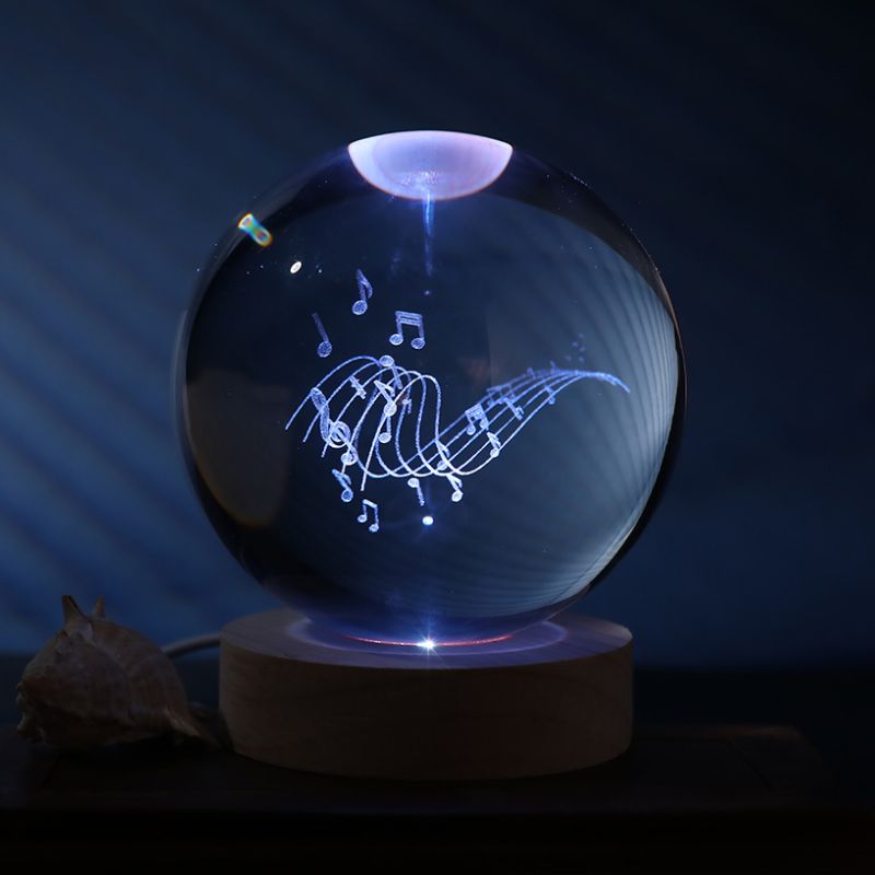 Bola de cristal 3D com notas musicais iluminadas por LED, 10cm