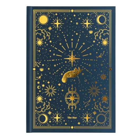Capa dura do caderno A5 com design astral detalhado em dourado, ideal para organizacao e criatividade.