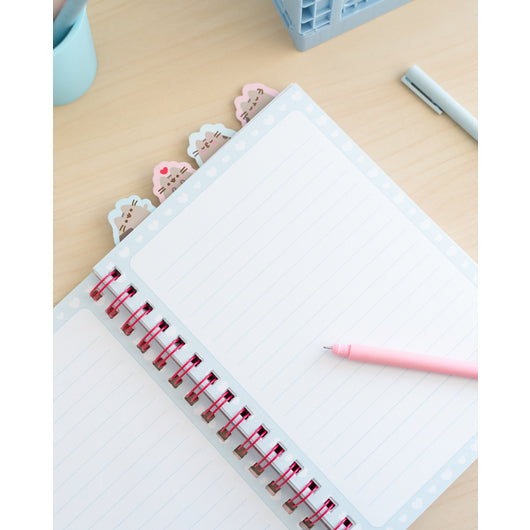 Páginas interiores do caderno Pusheen A5, com linhas perfeitas para anotações e organização.