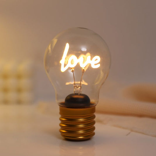 Lâmpada decorativa sem fios com LED "Love", luz quente e base dourada